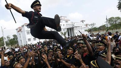 Indian army cadets celebrate after their graduation ceremony at The Officers Training Academy in Chennai. A total of 183 cadets including 37 women graduated from the academy and will be posted as Lieutenants in the Indian Army. Arun Sankar K / AFP