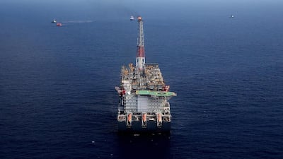 A gas flare burns on the Agbami floating oil production, storage and offloading vessel. George Osodi / Bloomberg