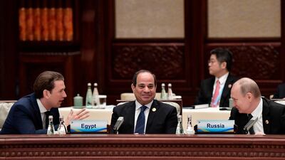 Russian President Vladimir Putin, right, Egypt's President Abdel-Fattah El-Sisi, center, and Austrian Chancellor Sebastian Kurz talk to each other during the Belt and Road Forum in Beijing, China. AP