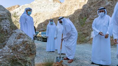 Sheikh Dr Sultan bin Muhammad Al Qasimi, Ruler of Sharjah, plants a tree as he inaugurates new projects aimed at attracting tourists to the emirate. Wam