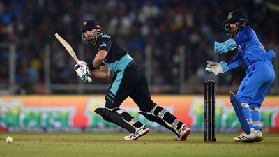 New Zealand's Daryl Mitchell plays a shot. AFP