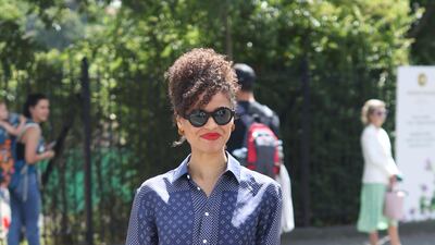 Actress Gugu Mbatha-Raw in a Ralph Lauren matching navy shirt and trouser set. PA