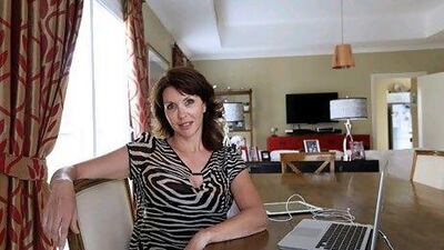 Like Louise Fichera, above, many women in the Emirates have given up on entrepreneurial ventures after being told they must rent out corporate office space instead of being allowed to start up a micro-business at much lesser cost from home. Satish Kumar / The National