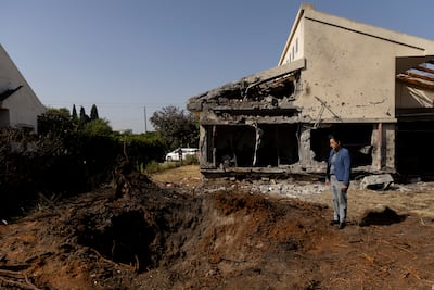 A crater left by a missile strike in Haniel, in central Israel, during joint Hezbollah and Iranian attacks. Getty Images