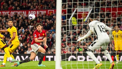 Harry Maguire scores a header to equalise for Manchester United.