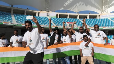 Crowds cheering ahead of Rahul Gandhi's speech today at Dubai International Cricket Stadium. Reem Mohammed / The National