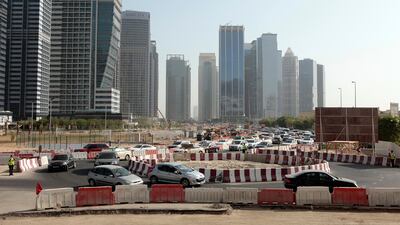 But some motorists said the guards they only made traffic worse. “People don’t even queue anymore, they just cut you off so it takes longer and it’s never been this bad,� said Kate McGrath, from the UK. Jeffrey E Biteng / The National