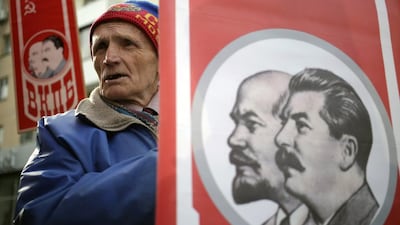 Russians in Simferopol, Crimea, commemmorate the 98th anniversary of the Bolshevik Revolution with portraits of Soviet Union founder Vladimir Lenin and leader Joseph Stalin, in November. Max Vetrov / AFP.
