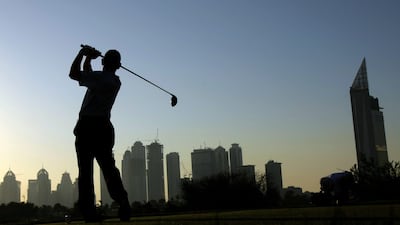 South African Louis Oosthuizen tees off on the eighth hole during the third day of the Dubai Desert Classic golf tournament in the Gulf emirate on January 31, 2009. In-form Oosthuizen found himself two strokes off the leader Irish teenage prodigy Rory McIlroy on the third day of the fog-hit Dubai Desert Classic. McIlroy was in pole position to chalk up his maiden win as a pro after a double eagle blast. AFP PHOTO/MARWAN NAAMANI *** Local Caption *** 214257-01-08.jpg