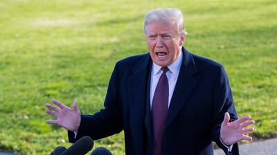 US President Donald Trump speaks to the news media on the South Lawn of the White House in Washington on Tuesday. Mr Trump and his family then departed on Marine One to the president's Mar-a-Lago Club in Palm Beach, Florida, for the Thanksgiving Holiday. EPA