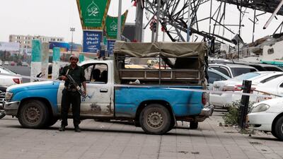 A Houthi fighter stands guard at a square as the country's intensified fighting continues, in Sana'a, Yemen. EPA