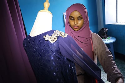 Hawa Adan Hassan and her peers are shaking up the local fashion market by selling locally designed and made pieces. AFP