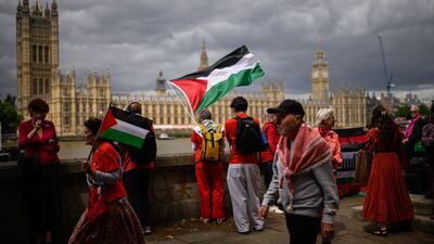 Pro-Palestine demonstrators face the Houses of Parliament in London in June. Getty Images
