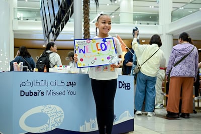 At DXB, families and friends waiting for passengers can also make personalised signs at the Make Your Welcome Home Sign station. Photo: Dubai Airports