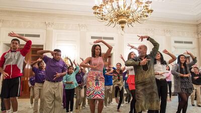 US First Lady Michelle Obama joins students for a Bollywood Dance Clinic in the State Dining Room of the White House. Official White House Photo by Chuck Kennedy