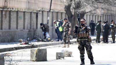 Afghan security officials inspect the scene of a suicide bomb blast that targeted a shrine visited by Shiite Muslims during the Nowruz Persian New Year, in Kabul, on March 21, 2018. EPA