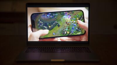 The League of Legends Wild Rift game is displayed on a Apple iPhone 12 during a virtual product launch. Bloomberg