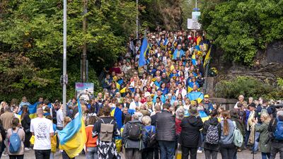 Crowds march during the Ukraine independence rally in Edinburgh. PA