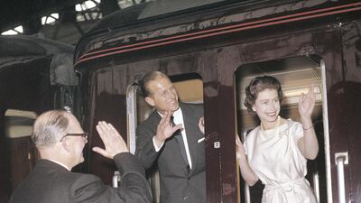Queen Elizabeth and Prince Philip leave Manchester by train in 1961. Getty Images
