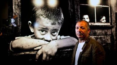 Turkish photojournalist H Tahir Ozgur poses with Sick Children, which won him Dh50,000 at the Emirates Photography Competition yesterday.