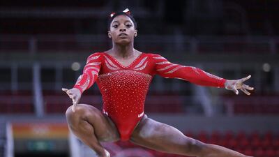 Simone Biles may be a 10-time world champion but that has not stopped her from being star-struck by fellow athletes. How Hwee Young / EPA