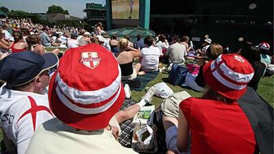 England fans watched the World Cup action in 2006 at Wimbledon, but no screens were showing the football yesterday during the third day of action.