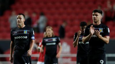Aston Villa's John Terry (L) and teammates. Andrew Couldridge/Reuters