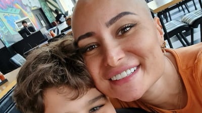 Sarah with her son Badr, 10, during chemotherapy in 2021.