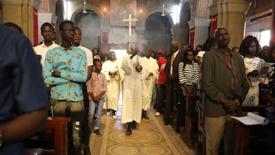 Christians attend a Christmas Mass at St. Matthew's Cathedral Church.