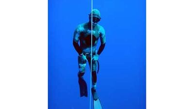Wassim Zein, who started freediving to home his spear-fishing skills, is pictured underwater.