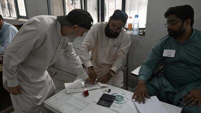 A man casts his vote during provincial assembly by-elections in Pakistan's Punjab province on Sunday. EPA