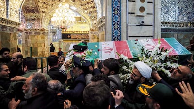 Mourners attend the funeral procession of Iran's president Ebrahim Raisi at a Shiite shrine, in Qom. AFP