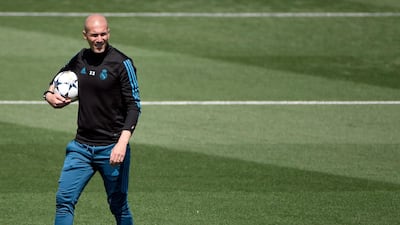 Real Madrid manager Zinedine Zidane oversees training ahead of the Uefa Champions League final. Gabriel Bouys / AFP