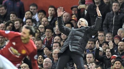 Jose Mourinho celebrates on the touchline during the match between Manchester United and Tottenham Hotspur at Old Trafford on December 11, 2016. AFP