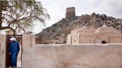 A worshipper at the 300-year-old Al Bidiya mosque in Fujairah.