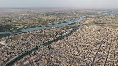 The Euphrates river flows through Syria's eastern city of Deir Ezzor. Reuters