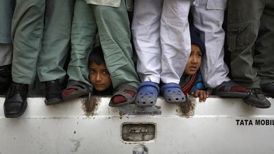 Muslim boys watch a parade marking the birth anniversary of the Prophet Muhammad in Kathmandu, Nepal. Navesh Chitrakar / Reuters