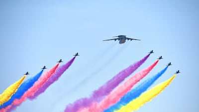 A Chinese KJ-2000 flies in formation with eight J-10 jets over a military parade in Tiananmen Square in Beijing on September 3, 2015, as China marks the 70th anniversary of victory over Japan and the end of the Second World War. Wang Zhao / AFP Photo