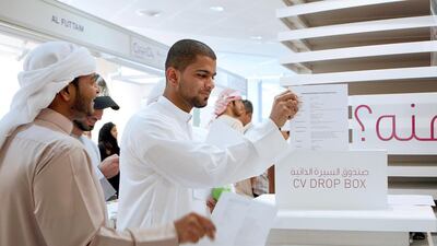 Emirati students during a jobs fair in Dubai. Less than 2 per cent of the country’s 2.2 million private sector jobs are occupied by Emiratis, according to TCO Management Consulting research. Paulo Vecina / The National
