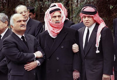 Jordan's King Abdullah II stands with his uncles Prince Mohammed bin Talal, centre, and Prince Hassan bin Talal, left, during the funeral his father, King Hussein, on February 8, 1999 in Amman. AFP