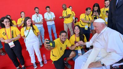 Pope Francis meets with World Youth Day volunteers in Lisbon. Reuters