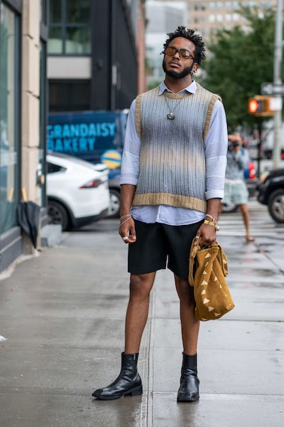A model wears Uniqlo JW Anderson, among other designers, as he attends the Bevza Spring Summer 2022 fashion show. AFP