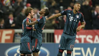 Mario Goetze, left, David Alaba and Jerome Boateng have given Bayern Munich fans plenty to cheer about this holiday season. Christof Stache / AFP