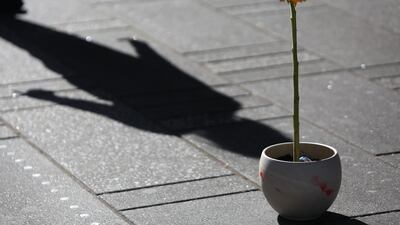 Ukraine's national flower, the sunflower, placed amid a crowd in Times Square. Getty Images