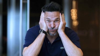 Dom Joly has a long list of careers – from being a television comedian to a being a travel author. Satish Kumar / The National