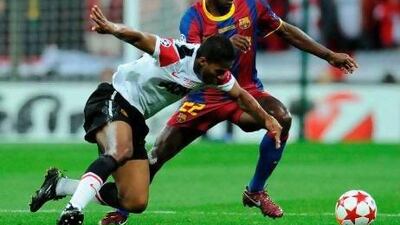 Eric Abidal, right, played in the 2011 Champions League final against Manchester United at Wembley. Franck Fife / AFP