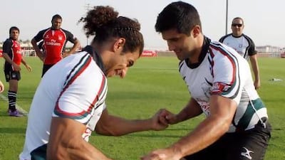 Emirati player Cyrus Homayoun, right, is one reason the UAE national rugby team may have a bright future in store.