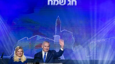 Israeli Prime Minster, Benjamin Netanyahu and his wife, Sara greet supporters during a gathering of the Likud Party to mark the Jewish holiday of Passover on April 16, 2019 in Jerusalem, Israel. Getty