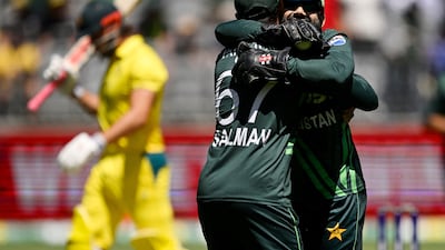 Pakistan captain Mohammad Rizwan after taking a catch to dismiss Marcus Stoinis. EPA
