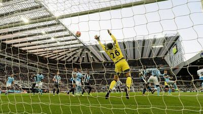 Newcastle goalkeeper Karl Darlow is beaten by a header from Sergio Aguero for the first goal. Stu Forster / Getty Images